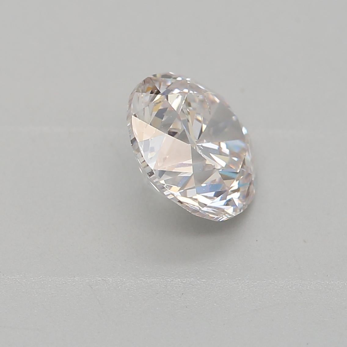 Women's or Men's GIA Certified 0.70 Carat Faint Pink SI2 Clarity Diamond For Sale