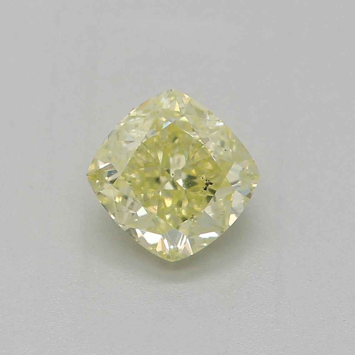 Certificate: GIA 
Report Number: 7441994916
Shape And Cut: Cushion
Carat Weight: 0.70 carat
Measurements: 4.97 x 4.79 x 3.32 mm
Color Grade: Fancy Green Yellow

FEATURES OF THE DIAMOND:

This fancy green yellow diamond is a rare and captivating