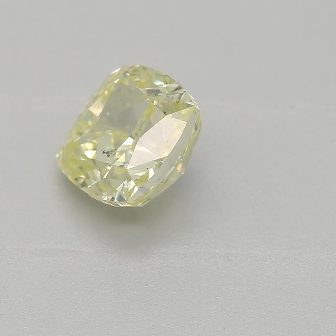 Cushion Cut GIA Certified 0.70 Carat Fancy Green Yellow SI1 Clarity Diamond For Sale