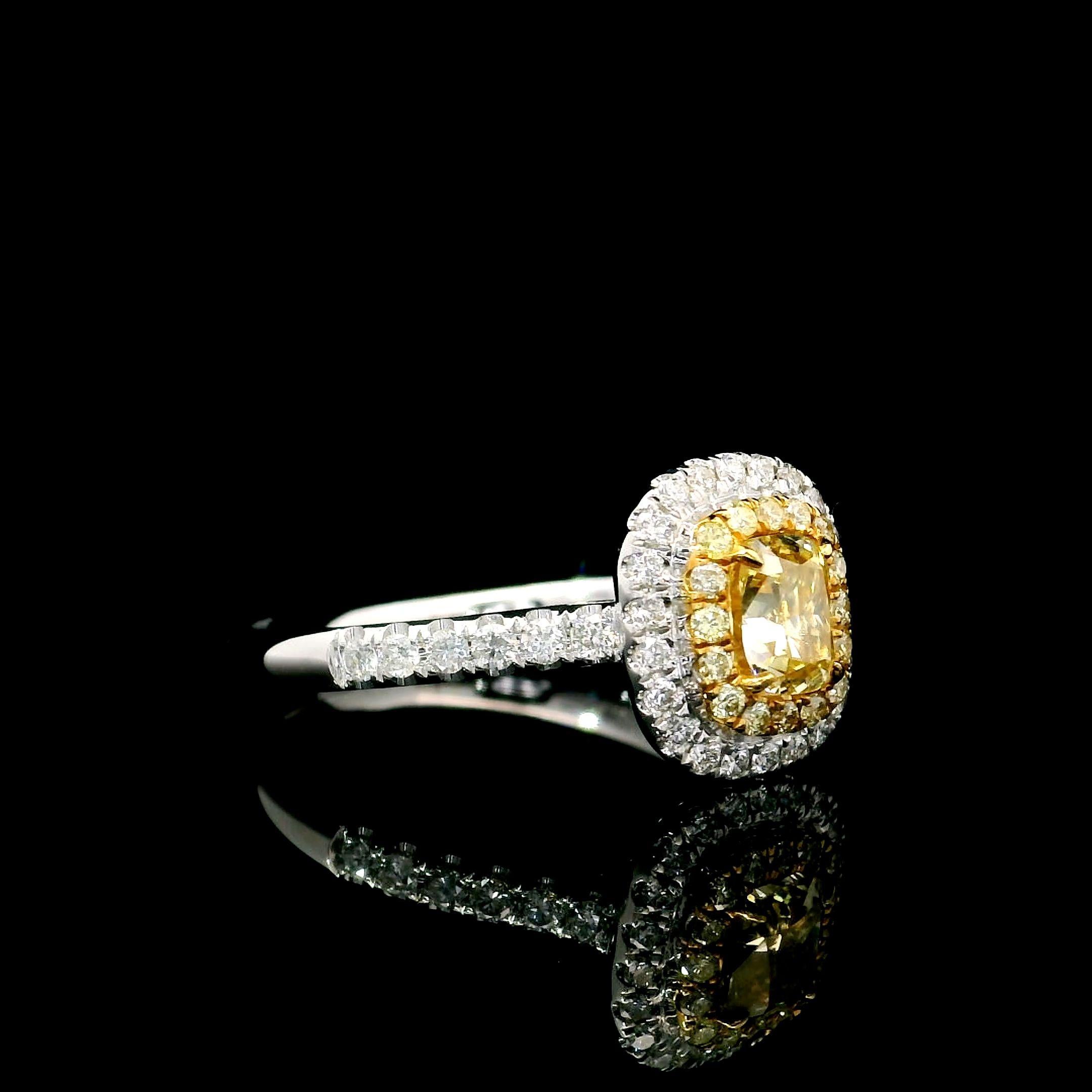 Cushion Cut GIA Certified 0.70 Carat Fancy Light Yellow VS1 Clarity Diamond Ring For Sale