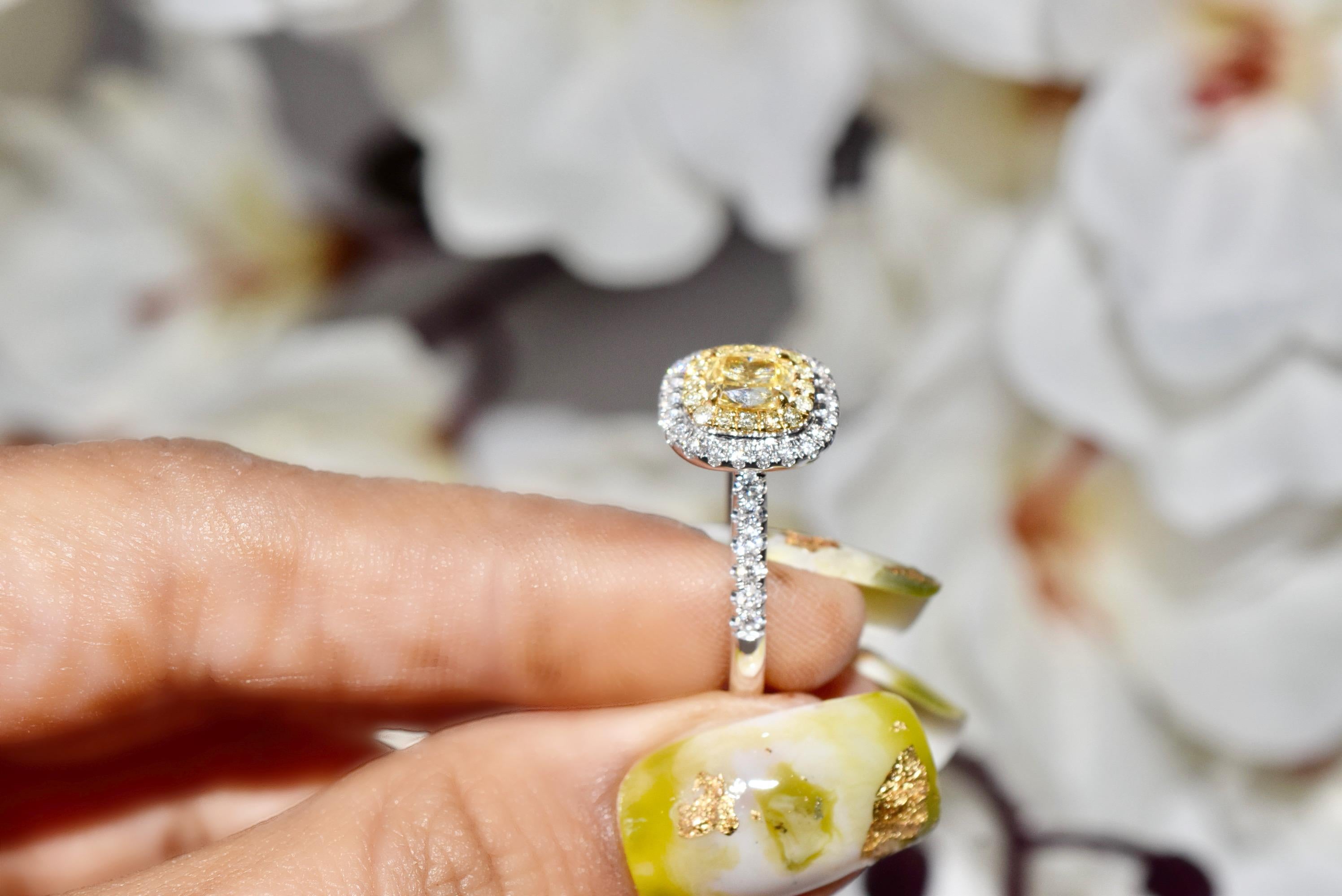 GIA Certified 0.70 Carat Fancy Light Yellow VS1 Clarity Diamond Ring For Sale 1