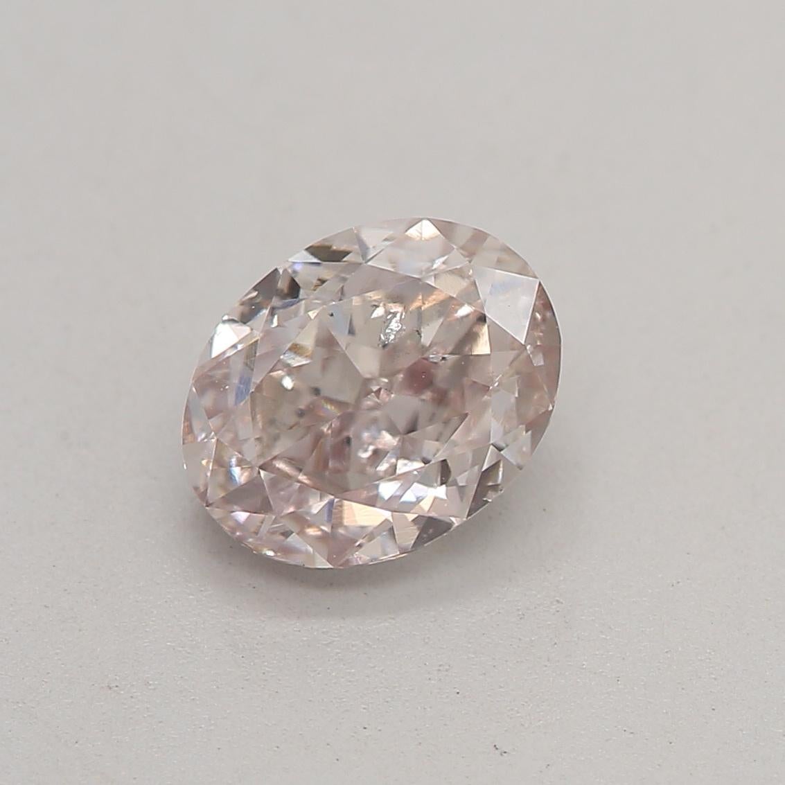 Certificate: GIA 
Report Number: 7343668635
Shape And Cut: Oval
Carat Weight: 0.70 carat
Measurements: 5.94 x 4.62 x 3.12 mm
Color Grade: Fancy Pinkish Brown 

FEATURES OF THE DIAMOND:

This Fancy Pinkish Brown diamond is a rare and unique diamond