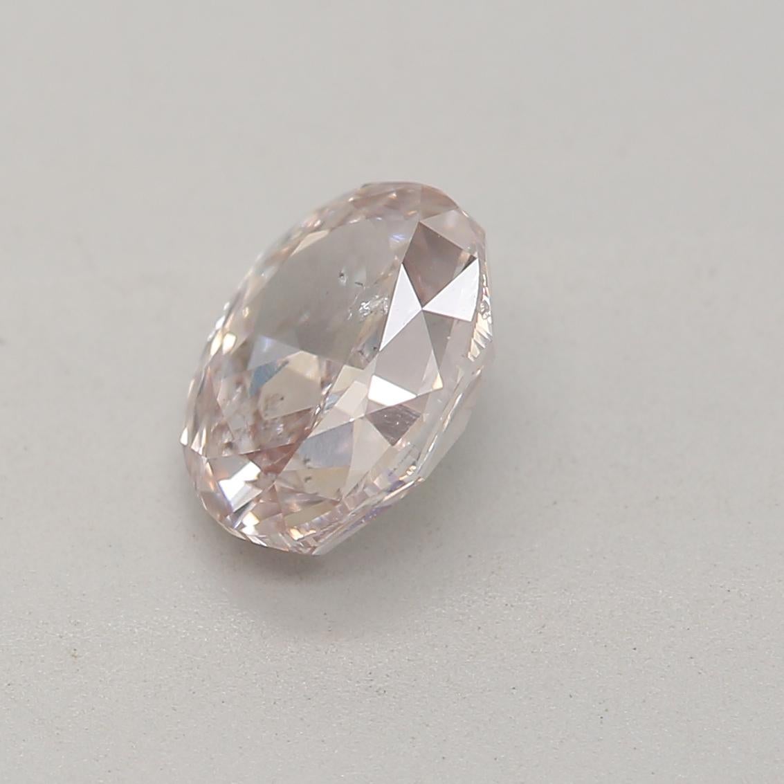Oval Cut GIA Certified 0.70 Carat Fancy Pinkish Brown SI2 Clarity Diamond For Sale