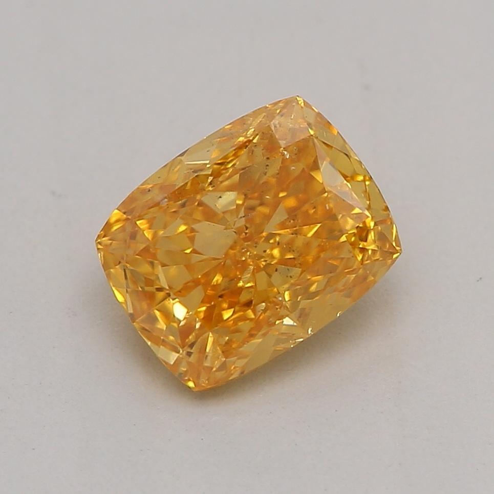 Certificate: GIA 
Report Number: 6412220665
Shape And Cut: Cushion
Carat Weight: 0.70 carat
Measurements: 5.62 x 4.49 x 3.01 mm
Color Grade: Fancy Vivid Orange Yellow

FEATURES OF THE DIAMOND:

This Fancy Vivid Orange Yellow diamond is an