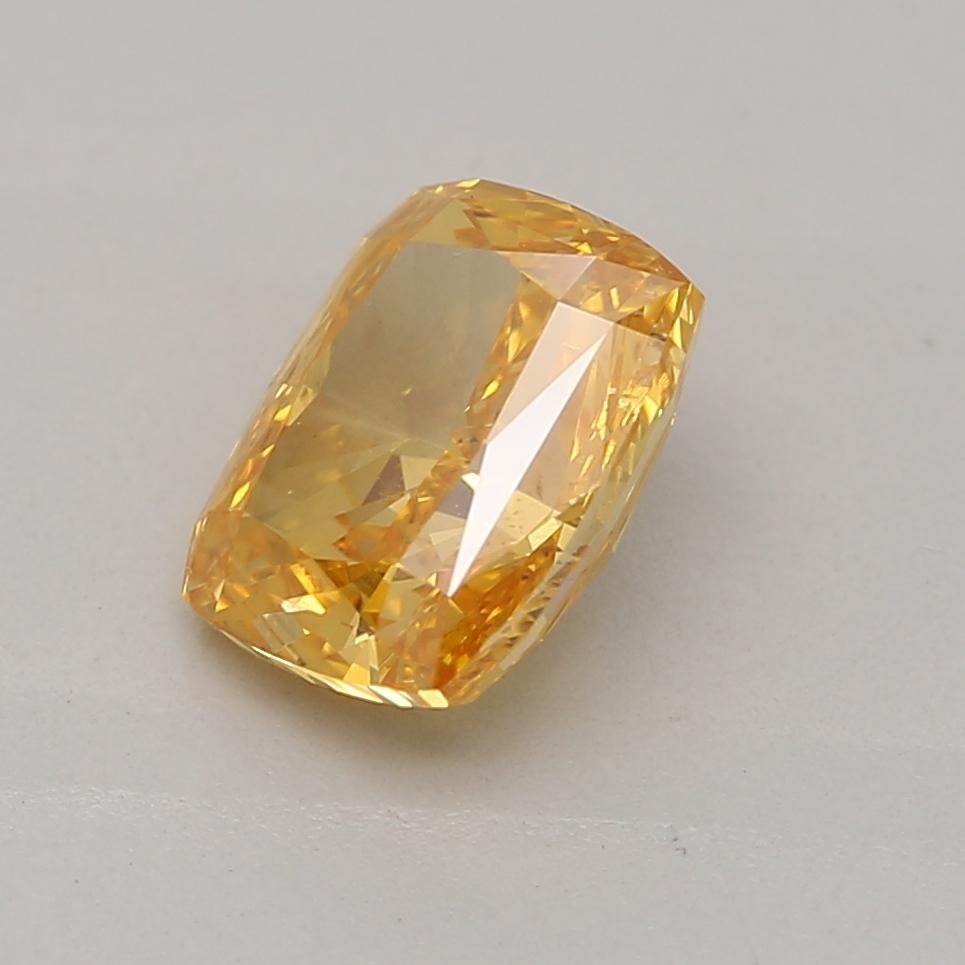 Cushion Cut GIA Certified 0.70 Carat Fancy Vivid Orange Yellow SI2 Clarity Diamond For Sale