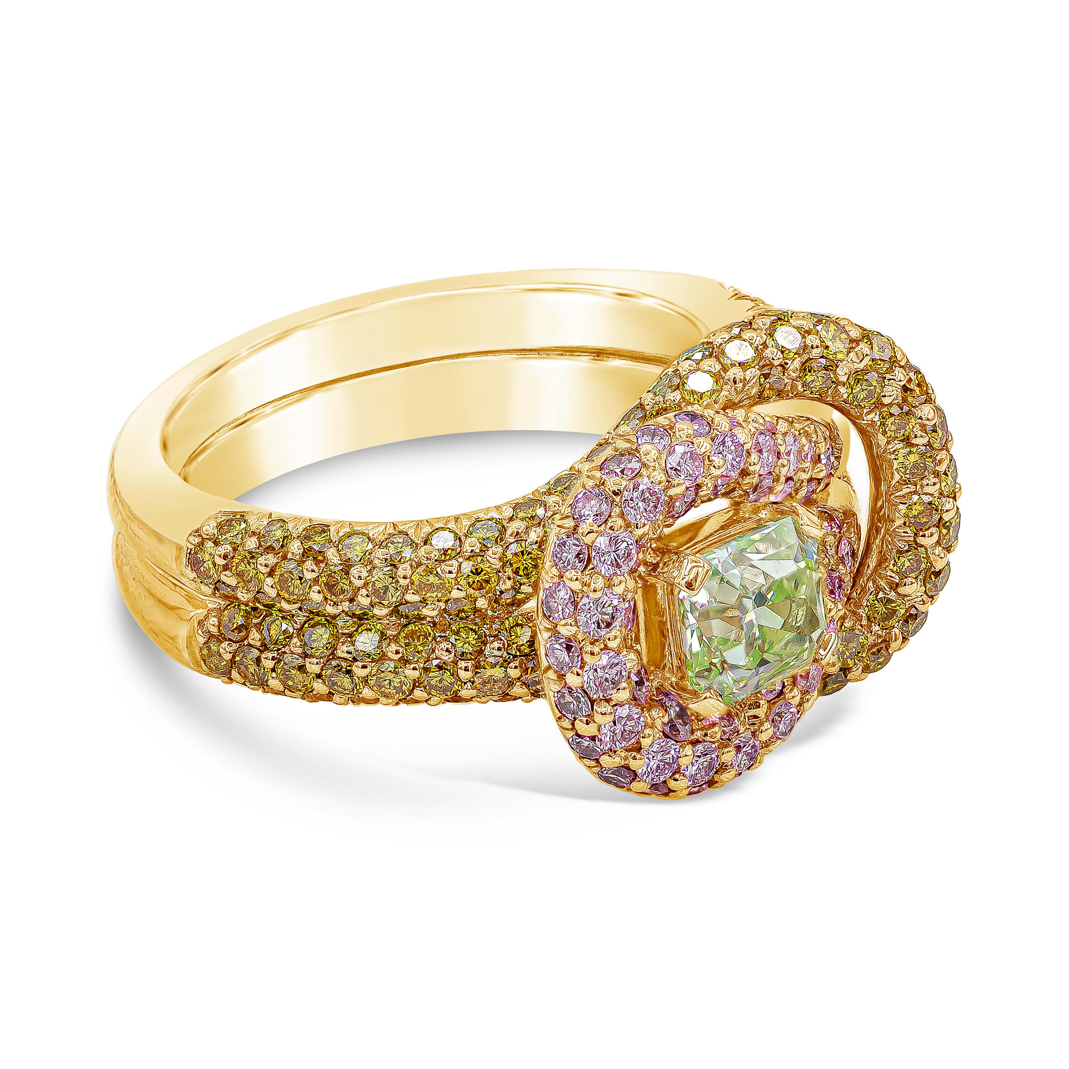 A beautiful 0.70 carat radiant cut diamond certified by GIA as Fancy Intense Green color and VS1 clarity, set on 18K rose gold. Accented by round brilliant cut yellow and pink diamonds, set on a knot-like design composition. Size 6 US, resizable