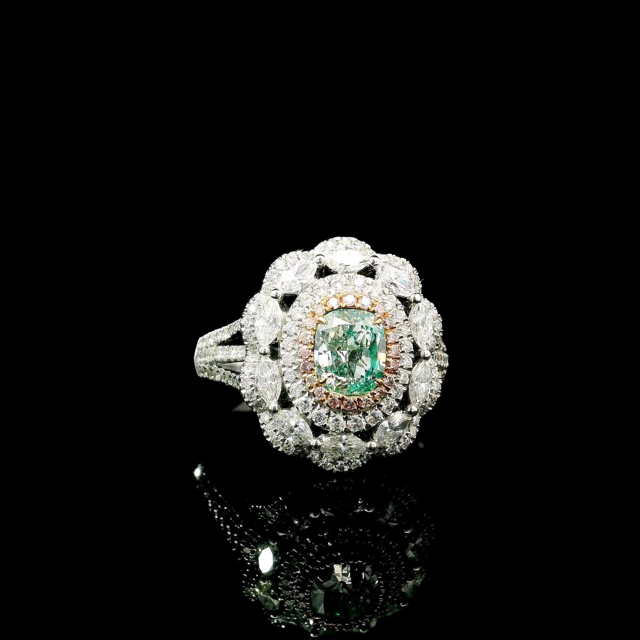 18kt white gold ring with diamonds
  
  Gold colour & karat: White gold 18kt
  Weight: 5.71 grams
  
  Set with-
  Stone type: Diamonds
  Shape: Cushion
  Carat: 0.70
  Colour: Light Green
  Clarity: I1
  
  Surrounding Stones: Diamonds
 1) White