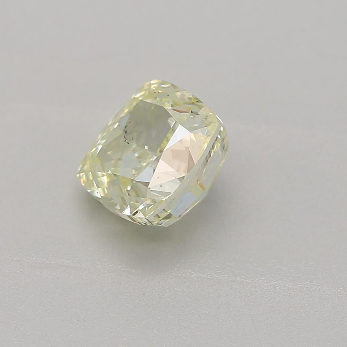 Cushion Cut GIA Certified 0.70 Carat Light Greenish Yellow SI1 Clarity Diamond For Sale