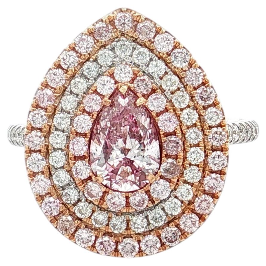 Anillo con un diamante certificado por el GIA de 0,70 quilates, de color marrón rosáceo claro y pureza SI2