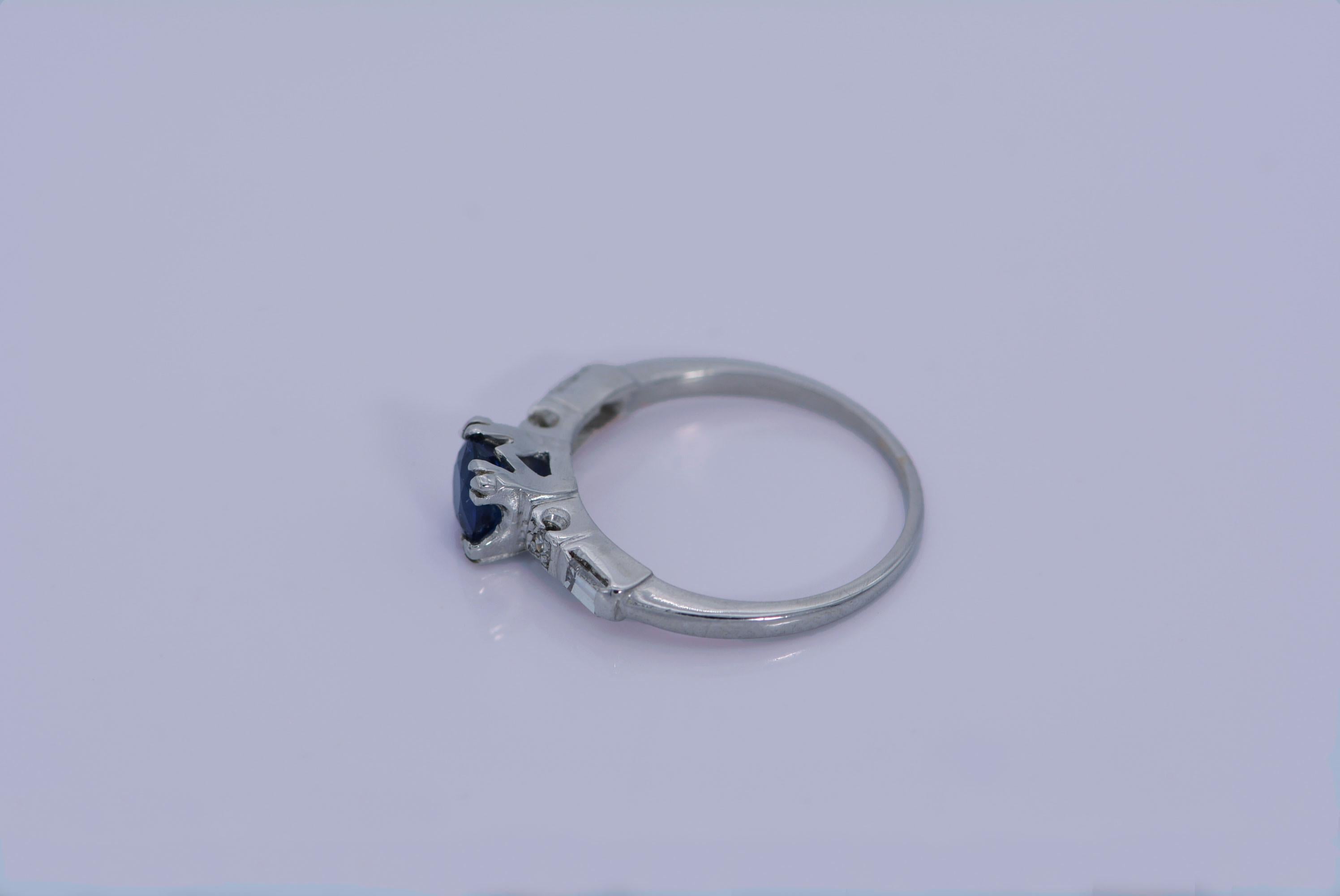 Modern GIA Certified 0.70 Carat Madagascar Sapphire and Diamond Platinum Ring For Sale