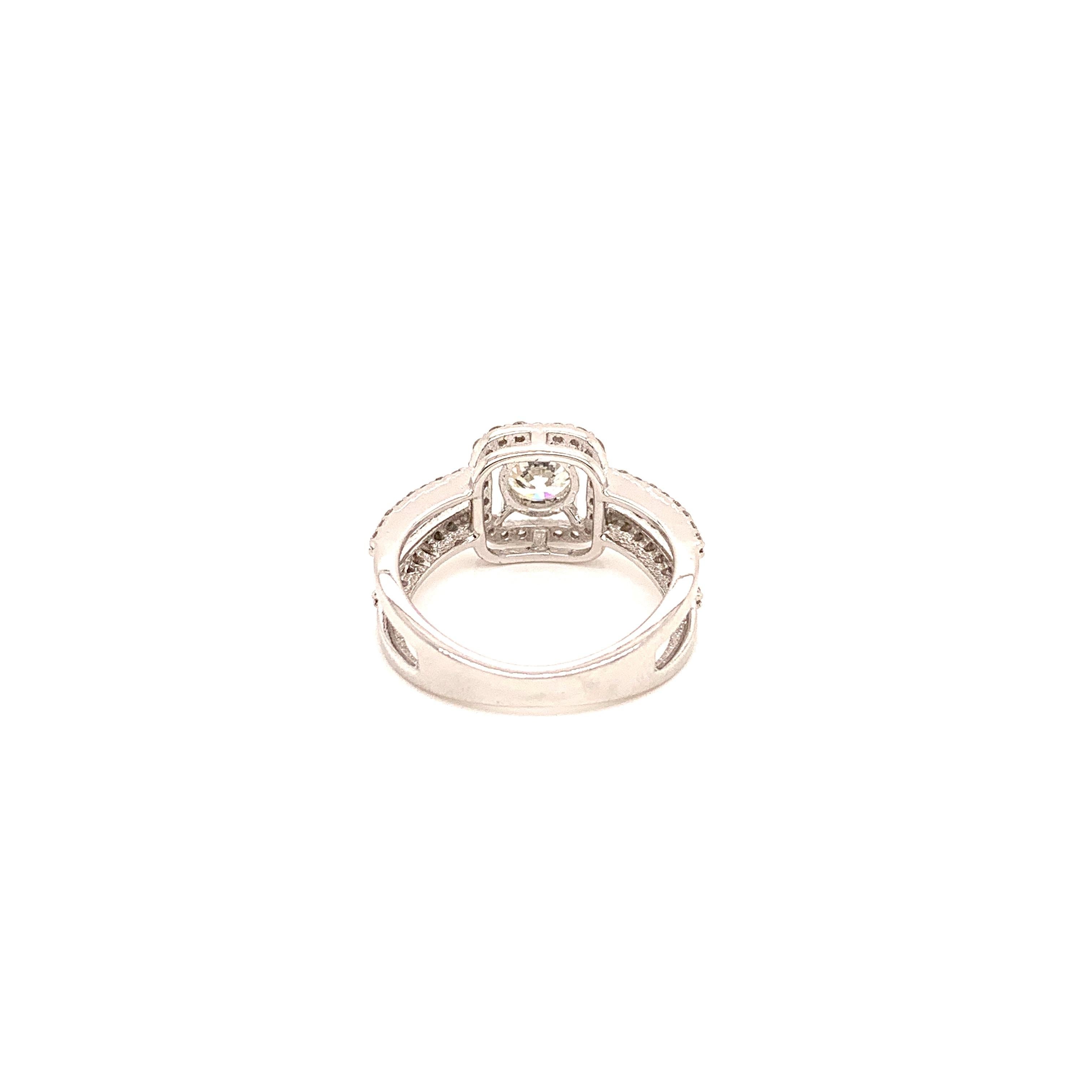GIA Certified 0.70 Carat Round Brilliant White Diamond Gold Engagement Ring:

A classic diamond engagement ring, it features a GIA certified 0.70 carat round brilliant cut white diamond in the centre, accentuated by white round diamonds weighing