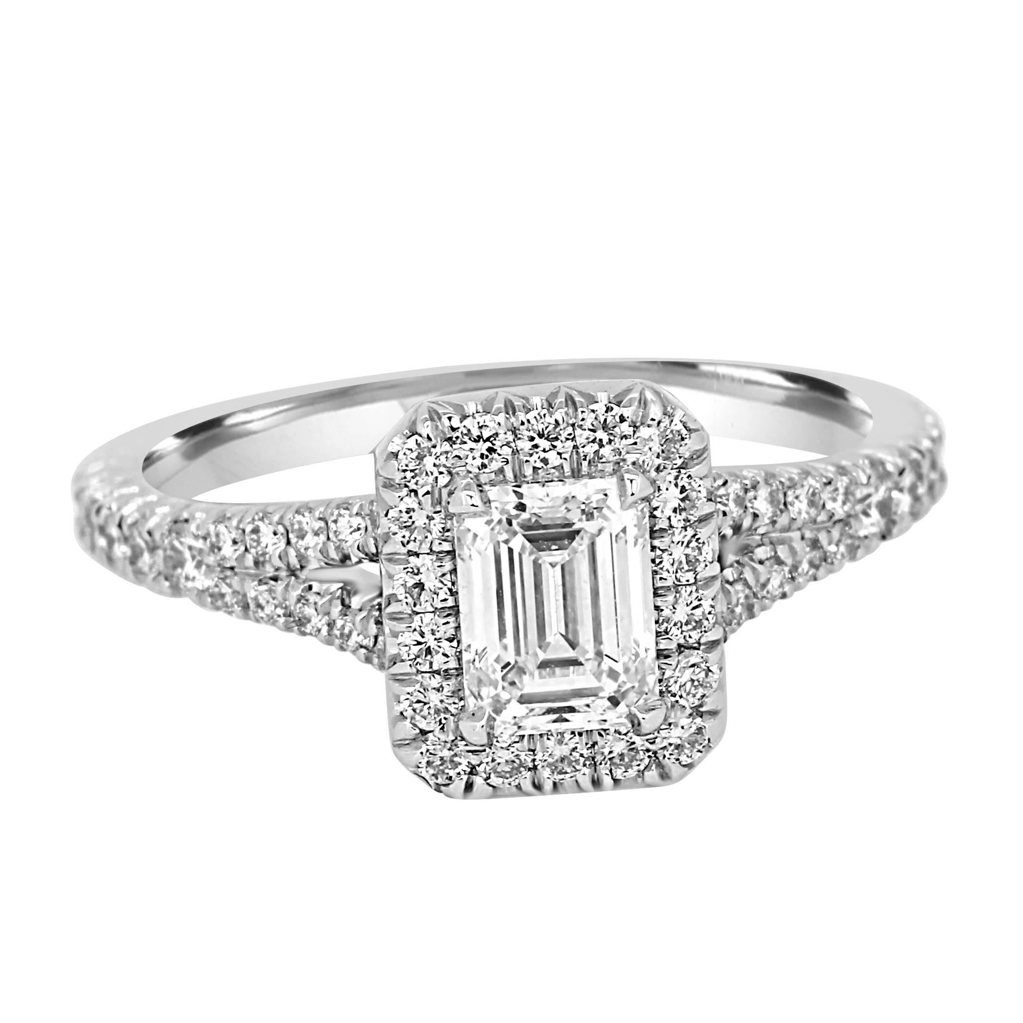 Stunning GIA Certified D Color VS 2 Clarity Emerald Cut Diamond 0.70 Carat Encircled in a Halo of White Round Diamonds 0.48 Carat in 18K White Gold and Platinum Split Shank Bridal Engagement Ring.

Style available in different price ranges. Prices
