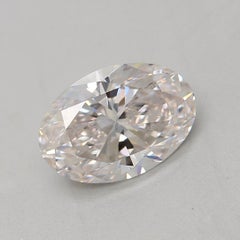GIA Certified 0.71 Carat Faint Pinkish Brown VS2 Clarity Diamond