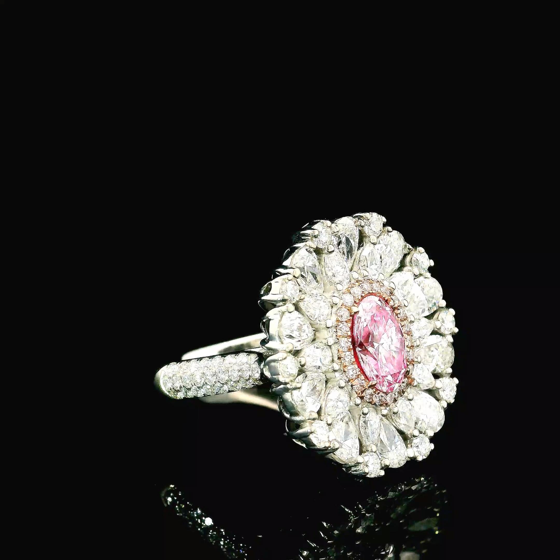 Oval Cut GIA Certified 0.71 Carat Faint Pinkish Brown VS2 Clarity Diamond Ring For Sale