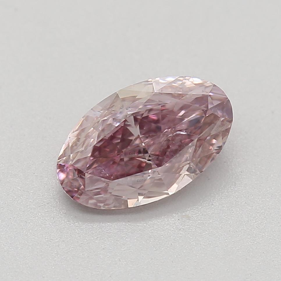 Certificate: GIA
Report Number: 6392896273
Shape And Cut: Oval
Carat Weight: 0.71 carat
Measurements: 7.31 x 4.50 x 2.70 mm
Color Grade: Fancy Purplish Pink

This fancy purplish-pink diamond is a rare and captivating diamond that combines the