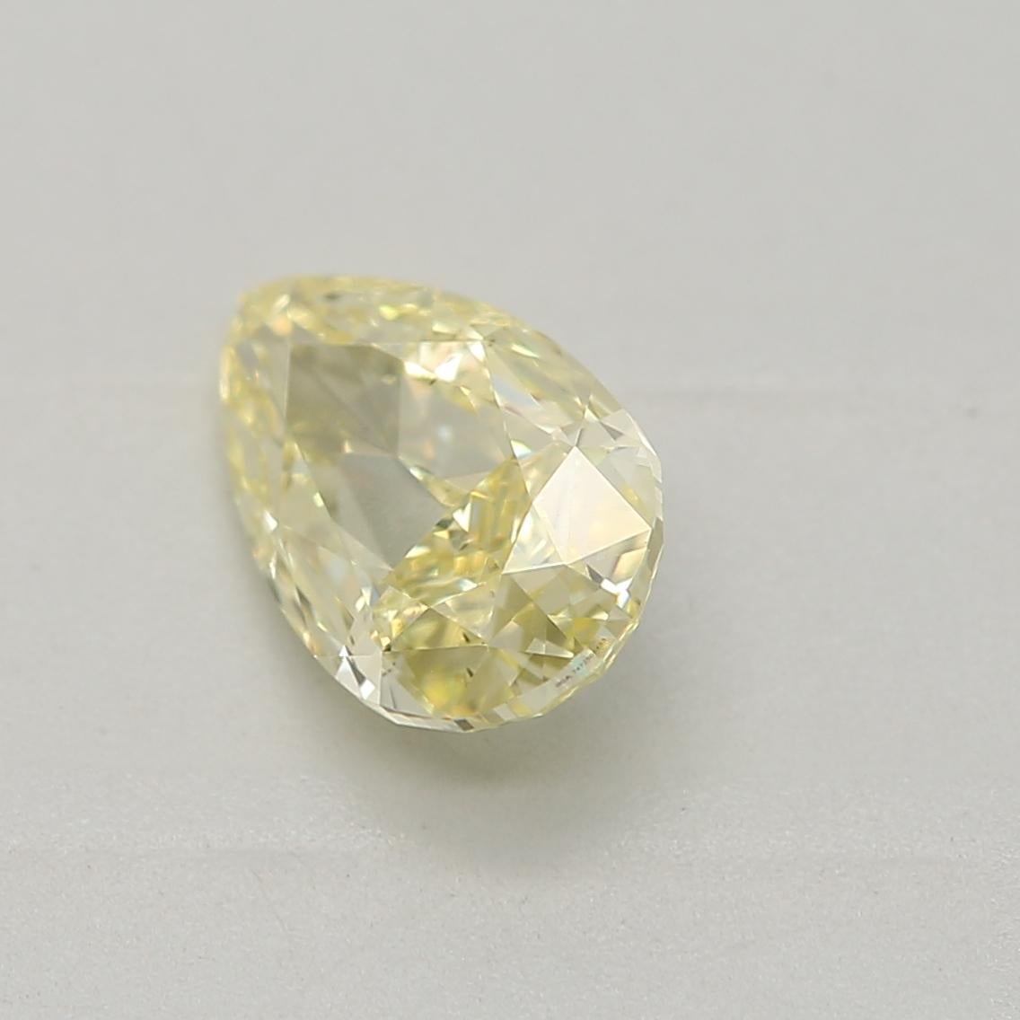 Pear Cut GIA Certified 0.71 Carat Fancy Yellow SI1 Clarity Diamond For Sale