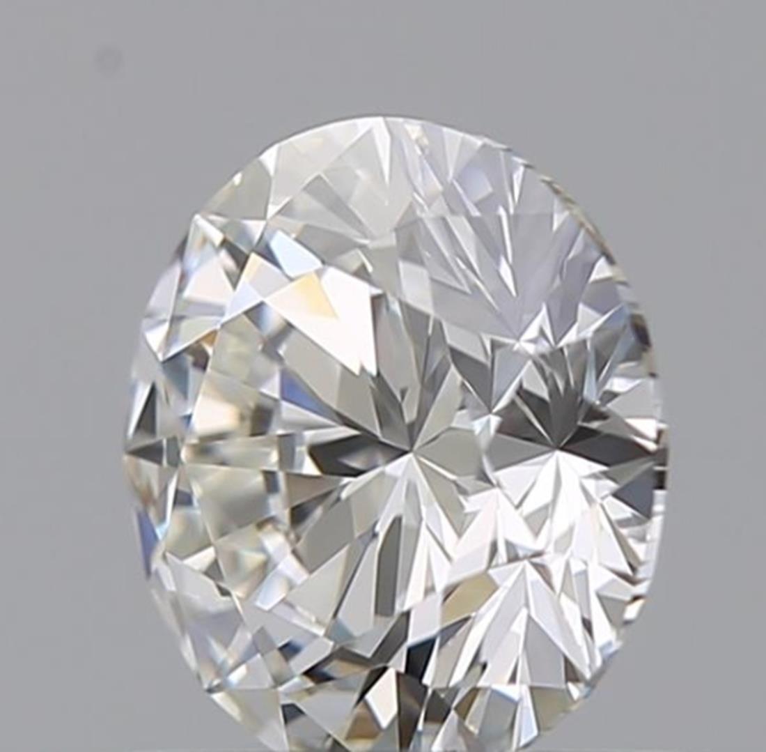 Round Cut GIA Certified 0.71 Carat G Colour VVS1 Clarity Diamond For Sale