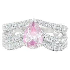 Anello con diamante rosa chiaro certificato GIA da 0,71 carati con purezza I2