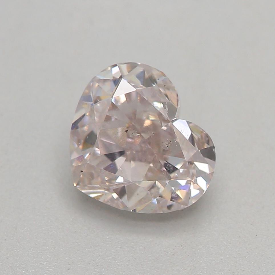 Certificate: GIA 
Report Number: 1415141211
Shape And Cut: Heart
Carat Weight: 0.71 carat
Measurements: 4.96 x 5.74 x 3.29 mm
Color Grade: Light Pink

FEATURES OF THE DIAMOND:

This light pink diamond is a rare and elegant diamond with a soft,