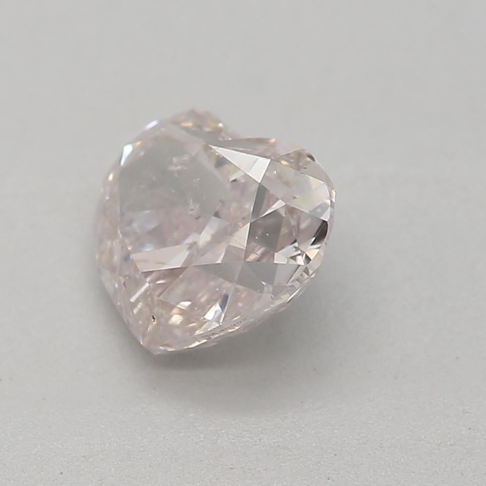 Heart Cut GIA Certified 0.71 Carat Light Pink SI2 Clarity Diamond For Sale