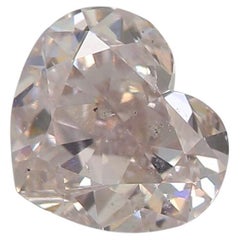 Diamante certificado por el GIA de 0,71 quilates de color rosa claro y claridad SI2