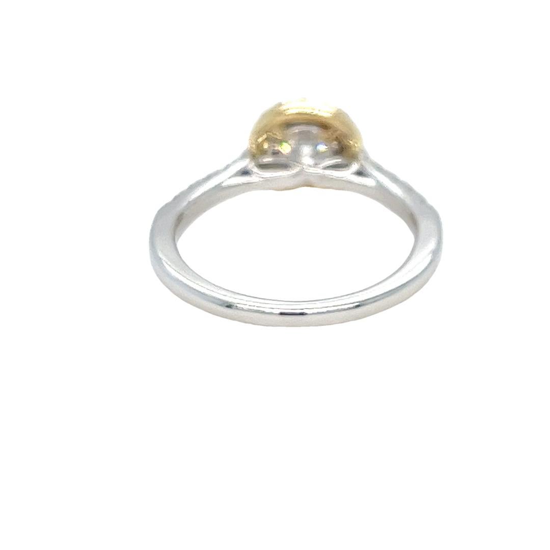 GIA Certified 0.71 carat round E/VVS1 diamond halo engagement ring In Good Condition For Sale In Coral Gables, FL