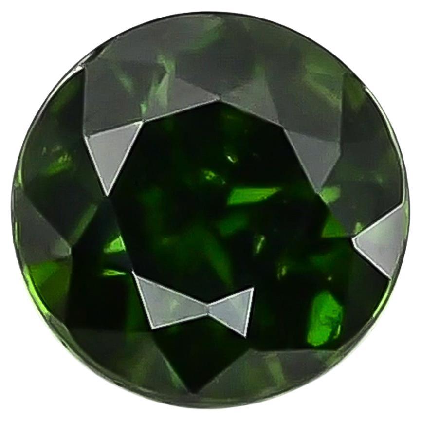 GIA Certified 0.71 Carats Russian Demantoid Garnet with 'horse tail' inclusions  For Sale