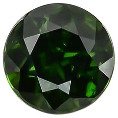 Garnet démantoïde naturel avec inclusions en forme de queue de cheval 0,71 carat / rapport GIA
