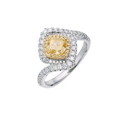 GIA Certified, 0.71ct Fancy Intense Yellow Natural Cushion cut diamond ring 18kt
