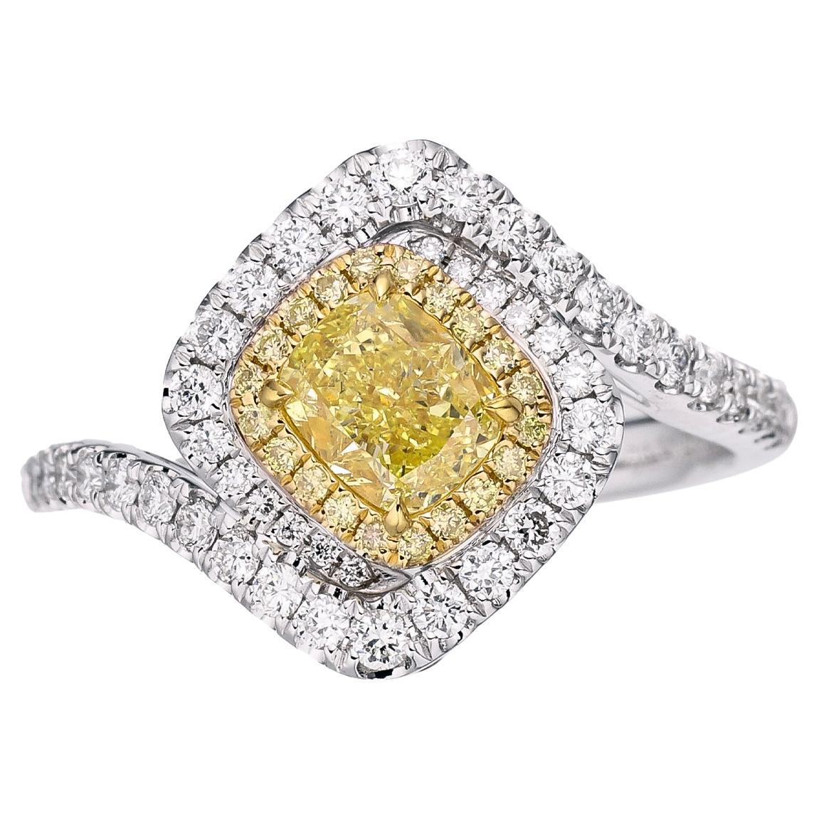 GIA Certified, 0.71ct Fancy Intense Yellow Natural Cushion cut diamond ring 18kt For Sale
