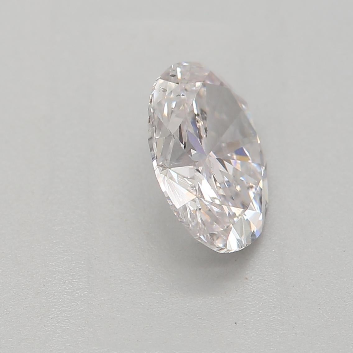 da uomo o donna Diamante certificato GIA da 0,72 carati di colore rosa tenue con purezza I1 in vendita
