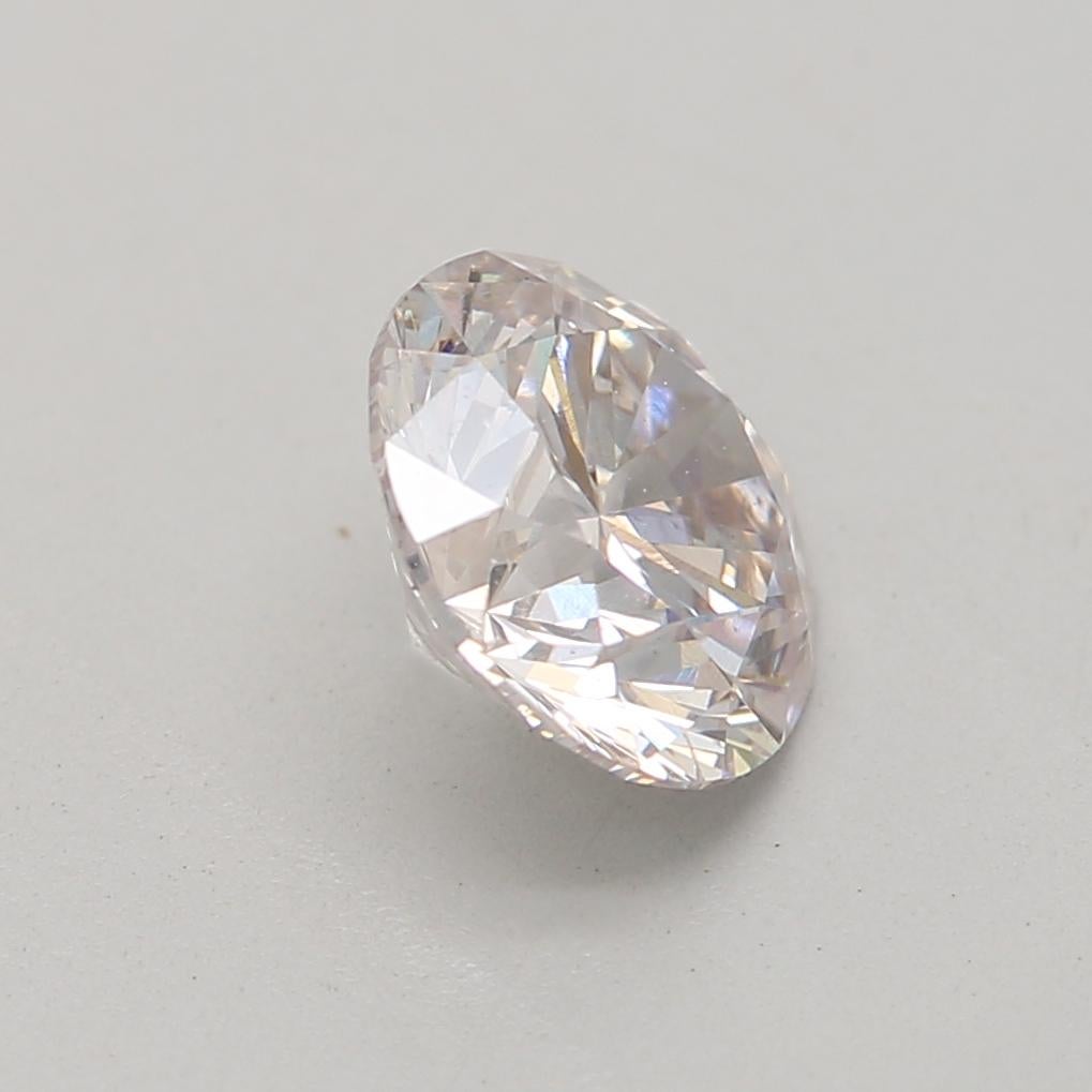 Women's or Men's GIA Certified 0.72 Carat Faint Pink SI2 Clarity Diamond For Sale