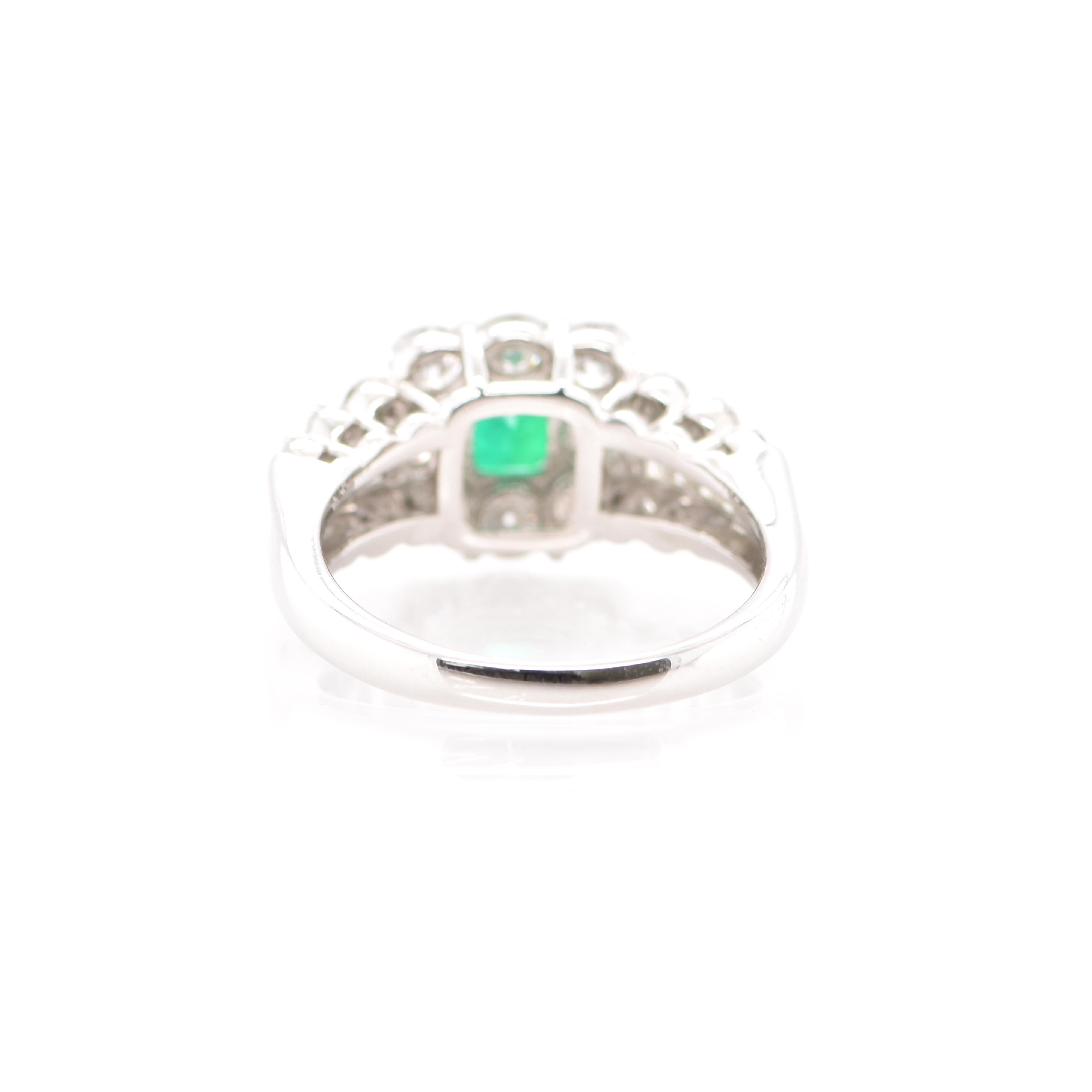 Women's GIA Certified 0.73 Carat Colombian Emerald and Diamond Ring Set in Platinum For Sale