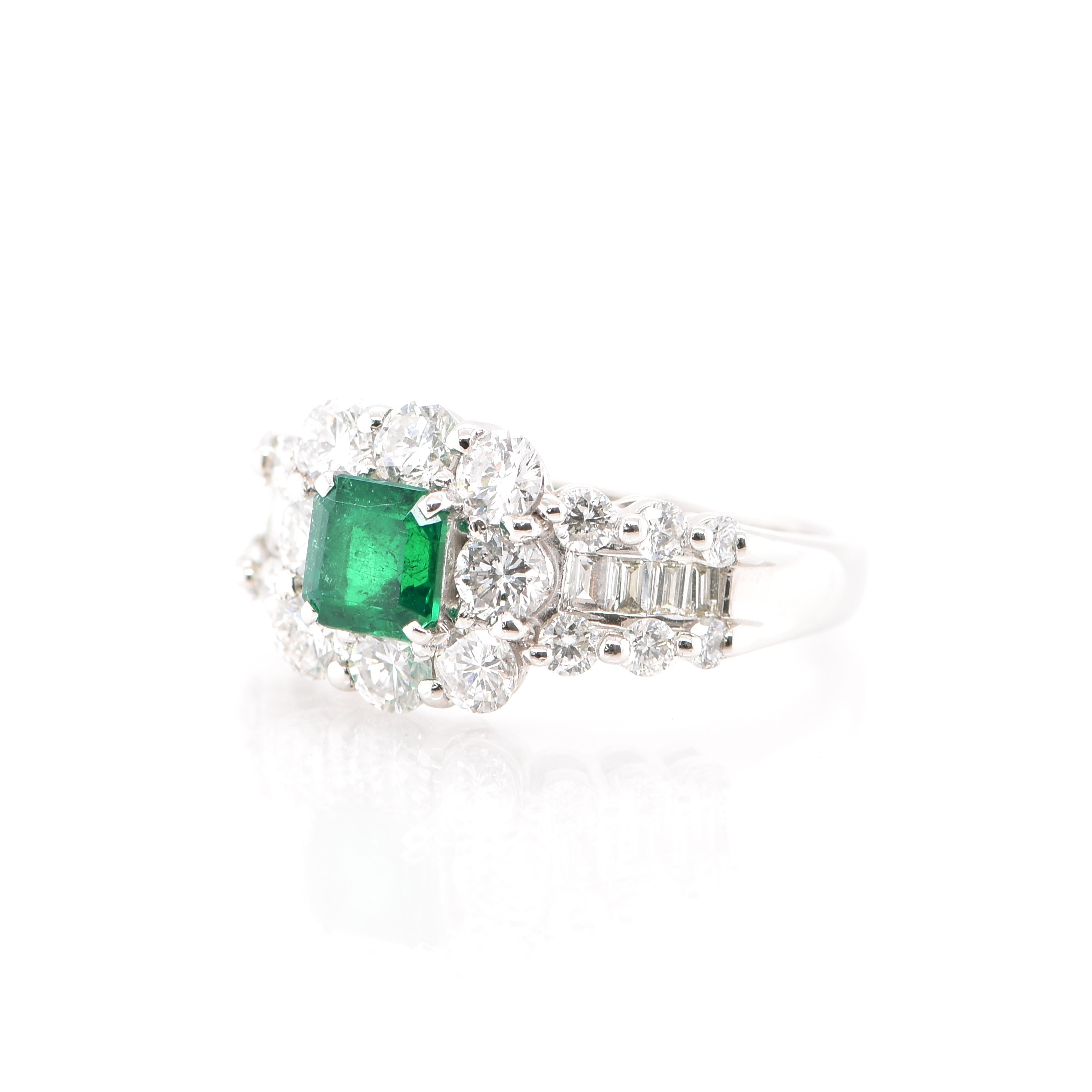 A stunning Halo Ring featuring a 0.73 Carat Vivid Green Emerald and 1.67 Carats of Diamond Accents set in Platinum. People have admired emerald’s green for thousands of years. Emeralds have always been associated with the lushest landscapes and the