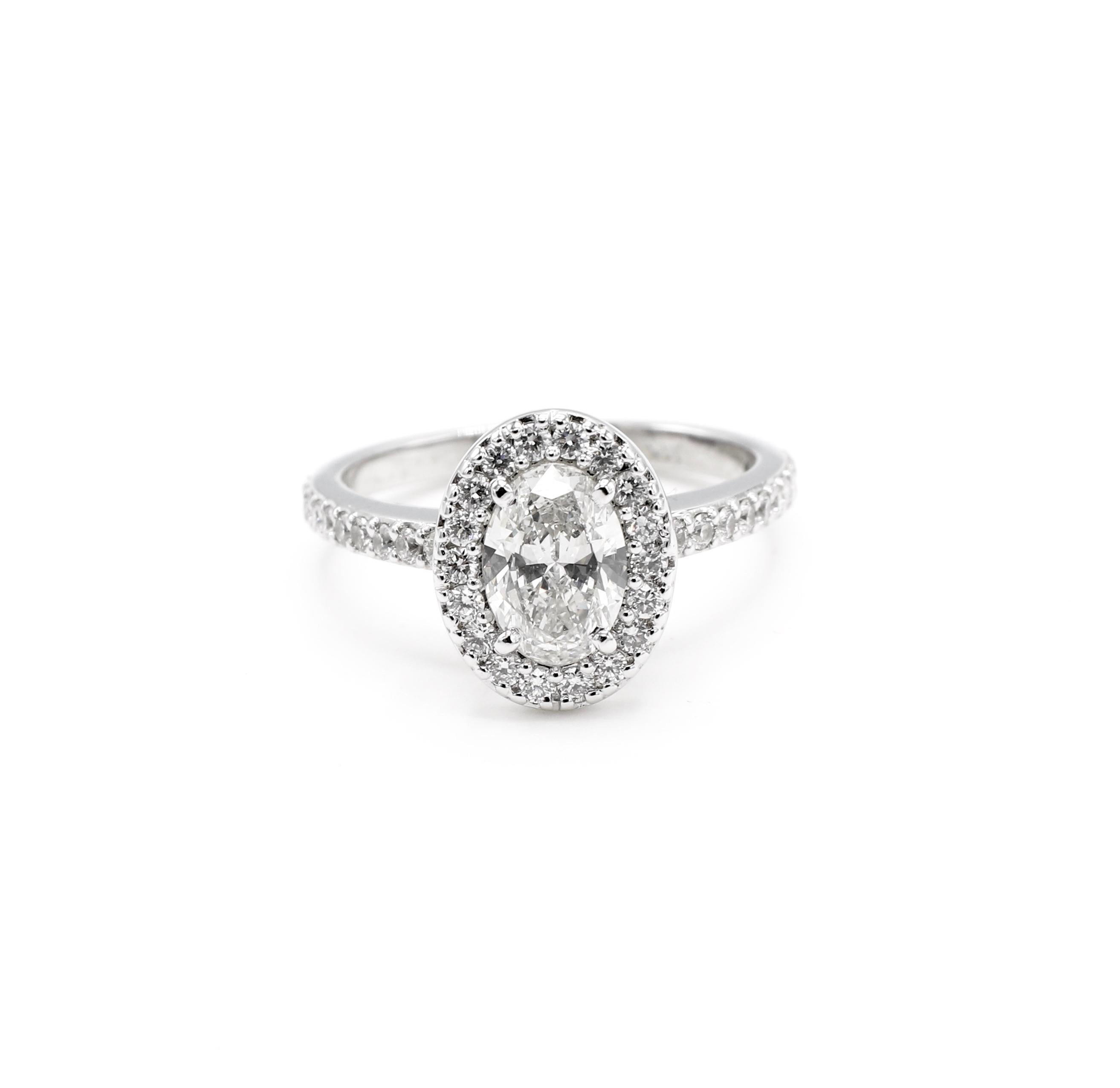GIA Certified 0.73 Carat Oval Diamond Halo Engagement Ring 14K White Gold 

GIA report number: 7222536884 (please note report copy pictured for details)
Diamond shape: Oval
Carat weight: 0.73 carat
Color grade: H
Clarity grade: SI1 
Polish: Very