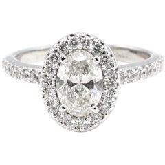 GIA Certified 0.73 Carat Oval Diamond Halo Engagement Ring