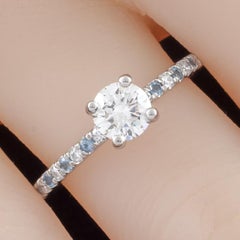 GIA Certified 0.73 Carat Round Diamond Palladium Ring with Aquamarine Accents