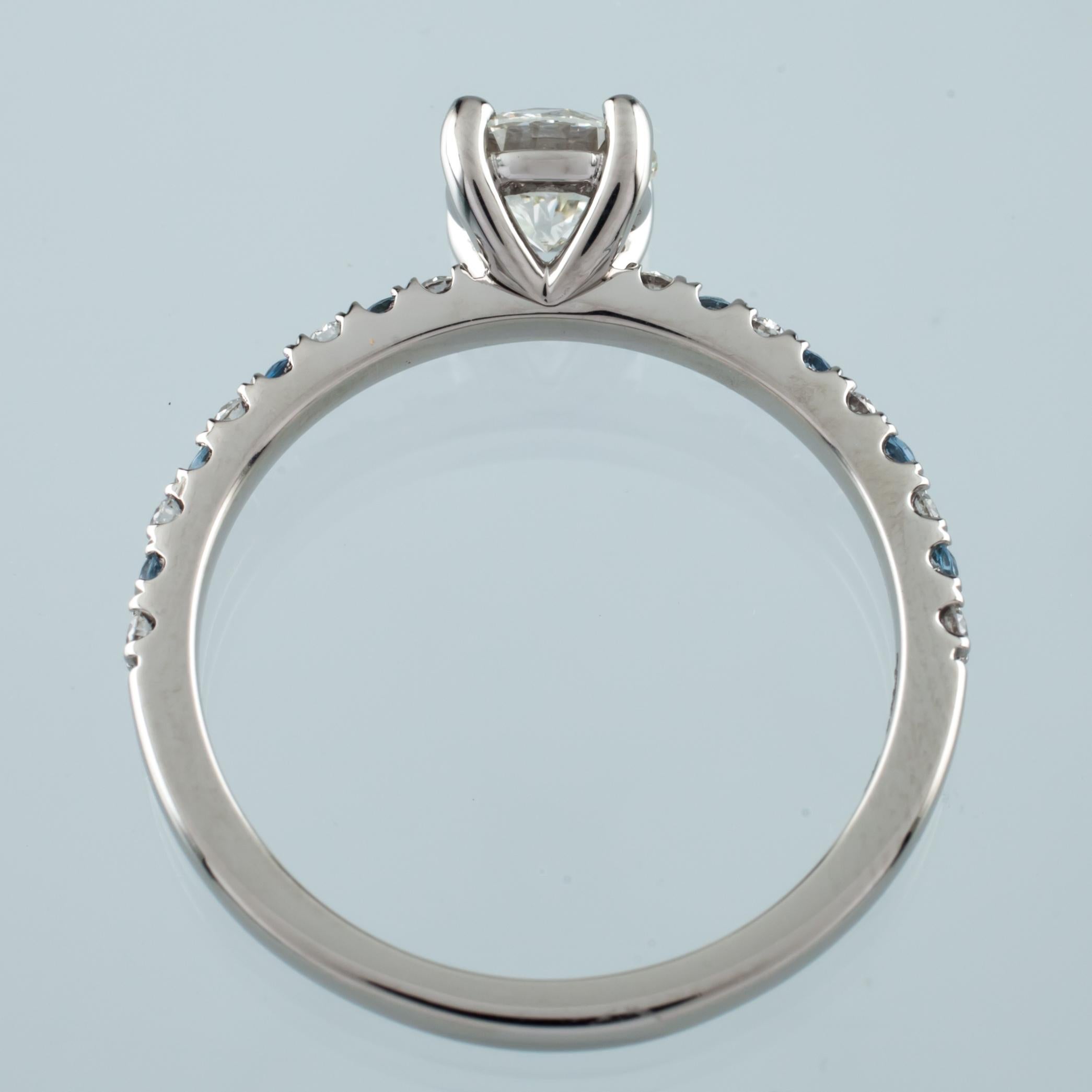 Round Cut GIA Certified 0.73 Carat Round Diamond Palladium Ring with Aquamarine Accents For Sale