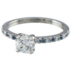 GIA Certified 0.73 Carat Round Diamond Palladium Ring with Aquamarine Accents