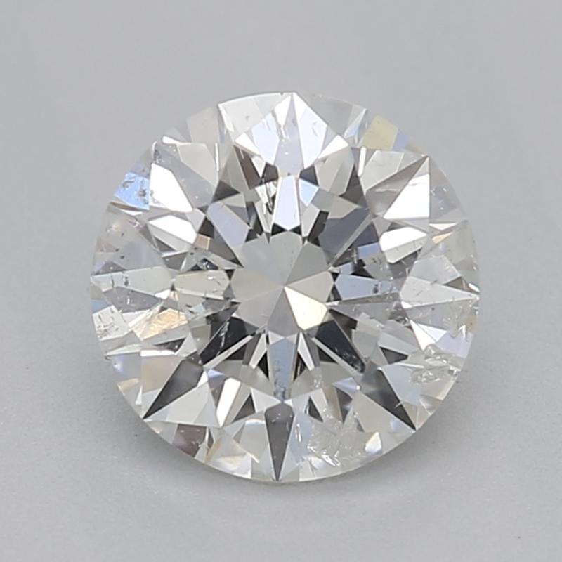 Dieser in New York handgefertigte, atemberaubende Diamantring mit einem bemerkenswerten runden H I1 0,73 als Mittelstein verkörpert die Essenz zeitloser Eleganz. Das Design zeigt ein einzigartiges, gedrehtes Geflecht, das den zentralen Diamanten