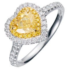 GIA Certified, 0.73ct Fancy Intense Yellow Heart Shape Diamond Ring in 18KT gold