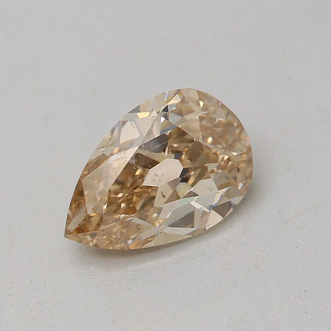Certificate: GIA 
Report Number: 5296531331
Shape And Cut: Pear
Carat Weight: 0.74 carat
Measurements: 7.32 x 4.92 x 2.93 mm
Color Grade: Fancy Light Yellow Brown

FEATURES OF THE DIAMOND:

This fancy light yellow brown diamond features a unique