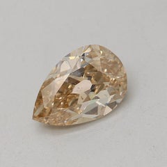 GIA Certified 0.74 Carat Fancy Light Yellow Brown SI1 Clarity Diamond