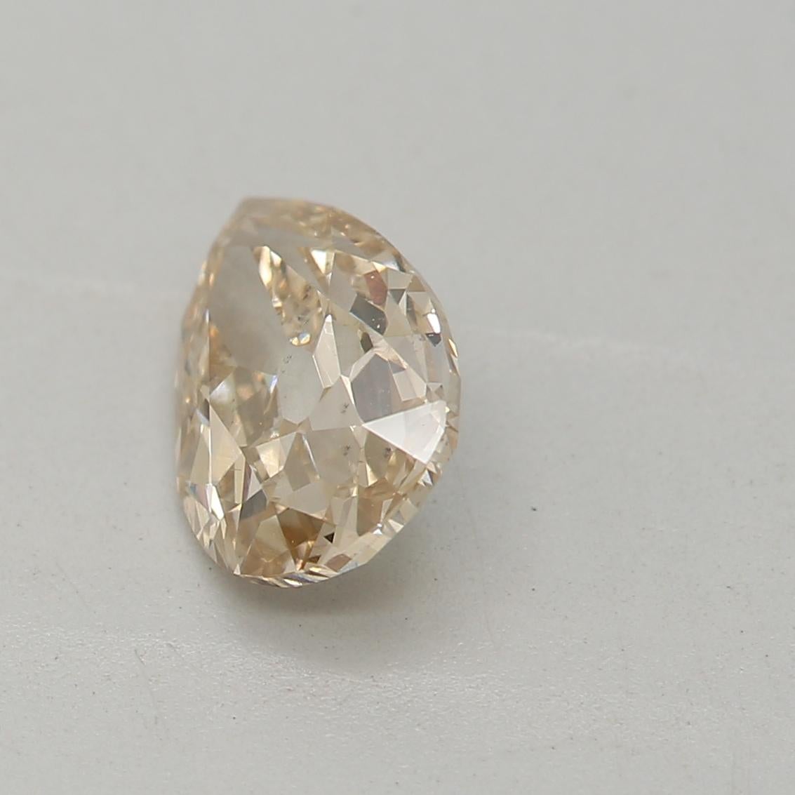 Pear Cut GIA Certified 0.74 Carat Fancy Light Yellow Brown SI1 Clarity Diamond For Sale