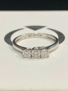GIA Certified 0.75 Ct D VVS1 Round Brilliant Three-Stone Ring in 18K White Gold