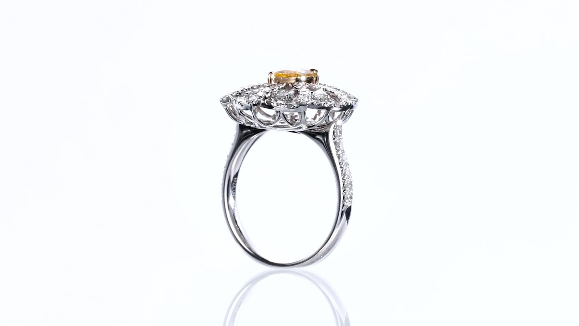 Contemporary GIA Certified. 0.75ct Pear Shaped Natural Fancy Vivid Orangy Yellow Diamond Ring For Sale