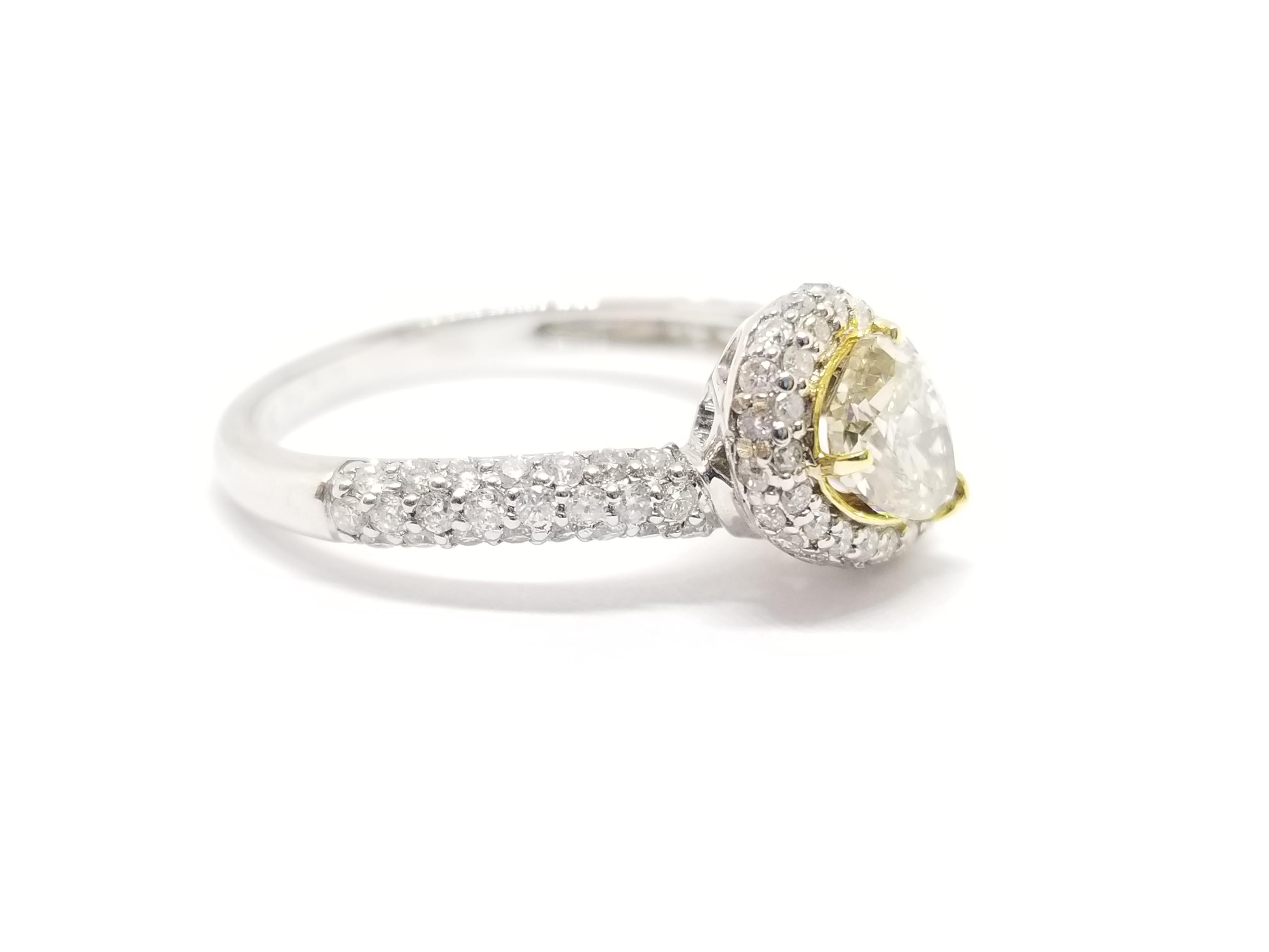 GIA Certified 0.76 Carat Fancy green, Yellow Pear Shape Ring in 18K White Gold In New Condition In Great Neck, NY