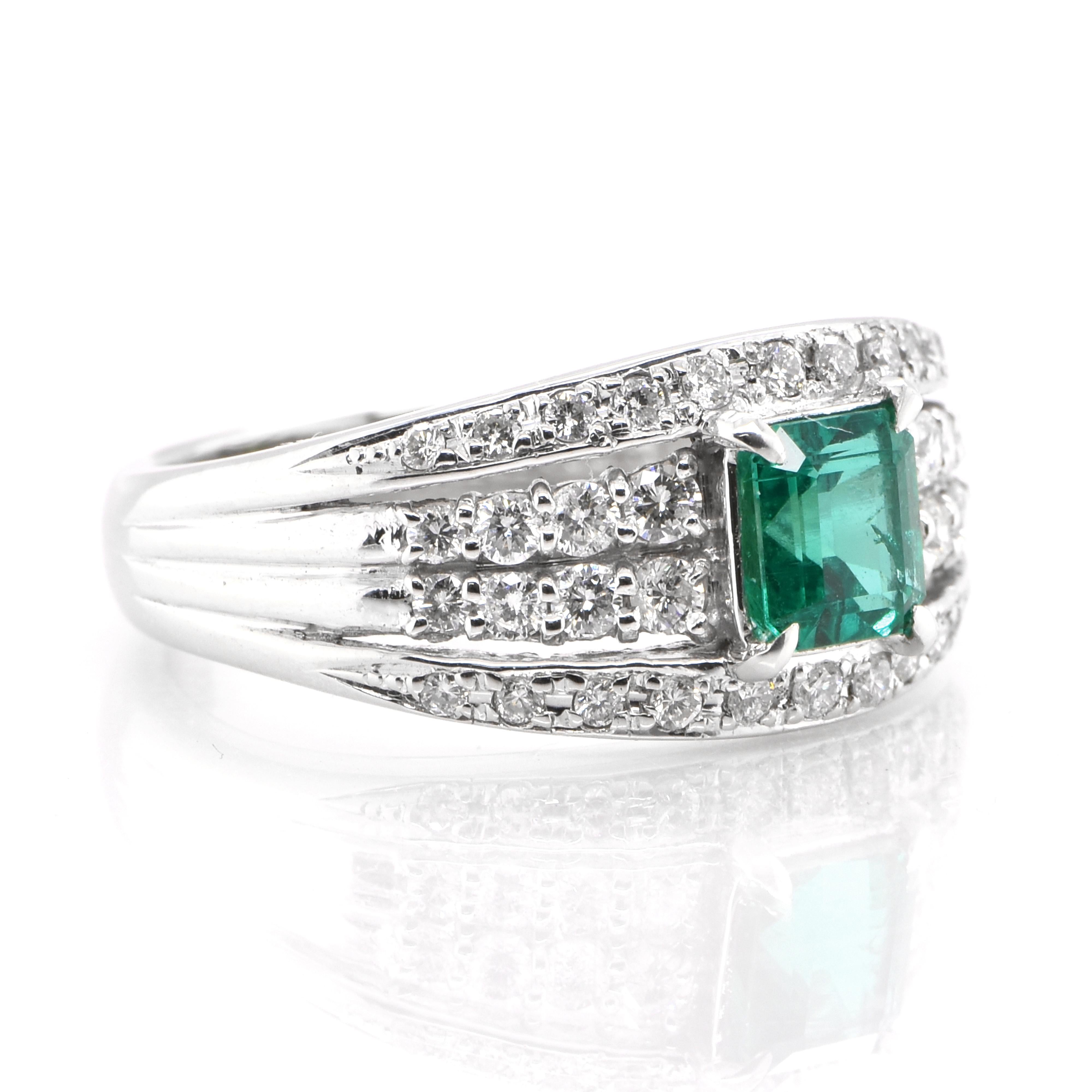 Modern GIA Certified 0.76 Carat Natural Colombian No Oil Emerald Set in Platinum