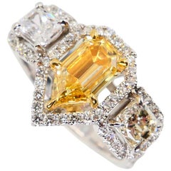GIA Certified 0.76 Cts Fancy Yellow VS1 Modified Pear Shape Diamond 3-Stone Ring