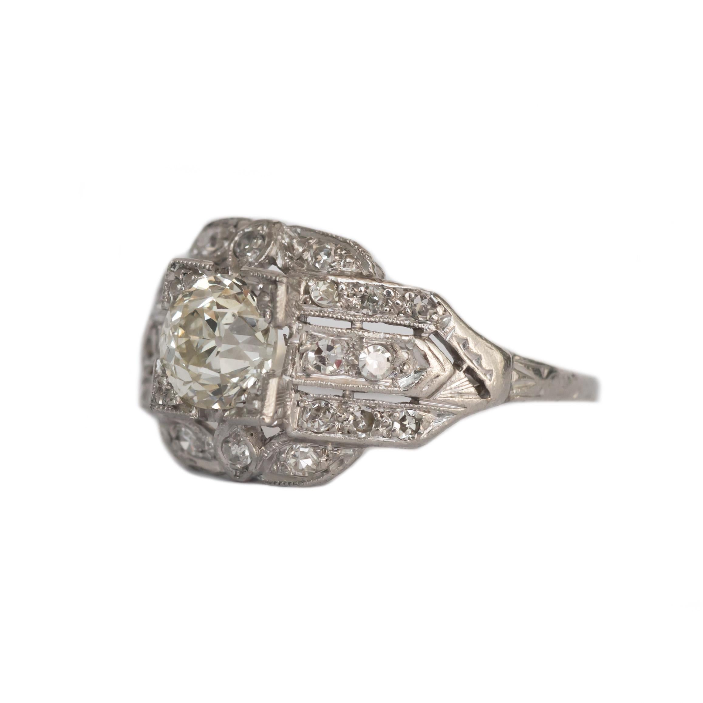 Ring Size: 4.5
Metal Type: Platinum
Weight: 3.7 grams

Center Diamond Details
GIA CERTIFIED Center Diamond - Certificate # 6194918635
Shape: Old European Brilliant 
Carat Weight: .77 carat
Color: L
Clarity: SI2

Side Stone Details: 
Shape: Antique